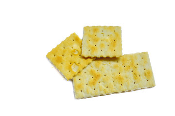 stack of yellow crakers on white background isolated