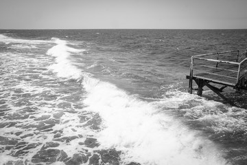 Stylish beautiful pier on the sea for ships background