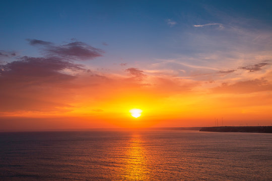 Fototapeta Sunrise over the beach