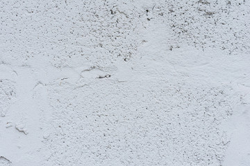 Wall fragment with scratches and cracks