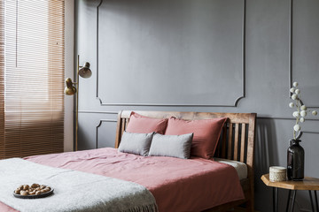 Grey and pink woman's bedroom