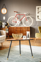 Vintage interior with table, bicycle