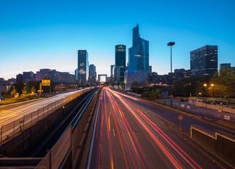 Light trails of cars in La Defense, Paris, France