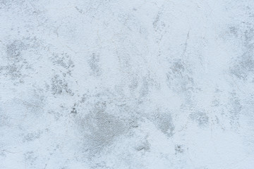 Wall fragment with scratches and cracks