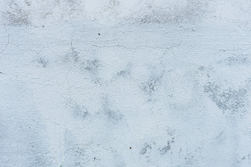 Wall fragment with scratches and cracks