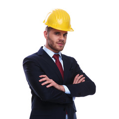 portrait of confident businessman wearing an engineer helmet