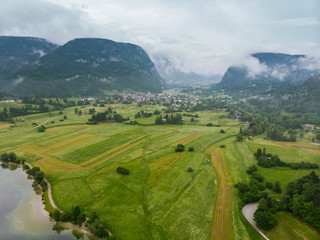 Fototapeta premium Rural landscape and Julian Alps, aerial view