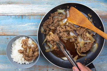 chef prepare served cooked beef with rice