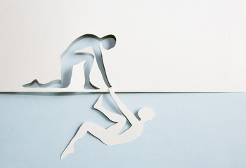 Abstract people helping to get out of problems. Paper cut composition 