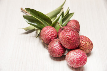 Lychee on wooden floor