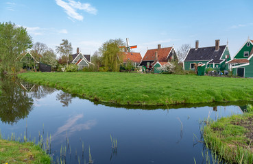 Fototapeta na wymiar rural scenery of old houses and canal in Zaanse Schans, Netherlands