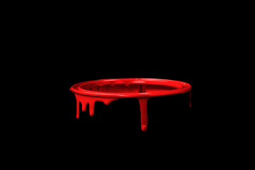 Red paint leaking over the wall of empty metal bucket