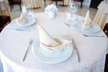 Served table in restaurant for three persons