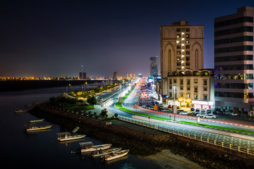 Fototapeta premium Ras Al Khaimah Corniche road and creek at dusk, the heart of northern emirate in UAE