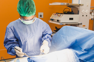 The surgical team is performing surgery for the patients in the operating room