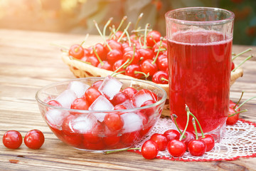 Natural homemade cherry compote drink with ice cubes