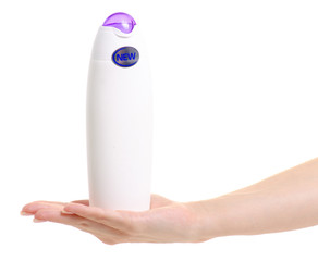 White bottle of shower gel lotion cream in hands new on a white background isolation