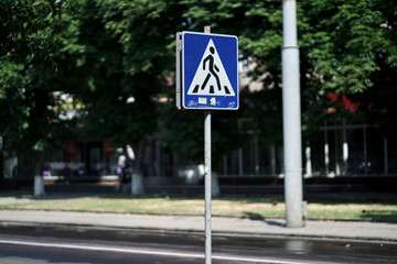 Zebra crossing, pedestrian cross warning traffic sign in blue and pole, isolated