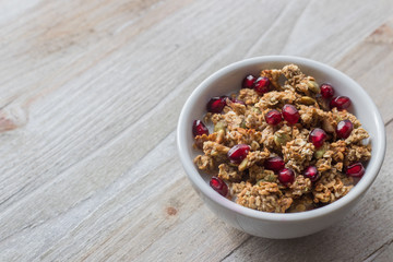 Granola Bowl with Pomegranate Seeds