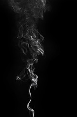 abstract fragment movement of white smoke on black background.