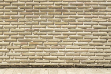 An ancient old rough drystone wall. Background photo. Texture pattern.