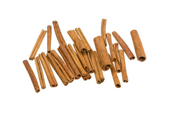 a lot of cinnamon sticks on a white background