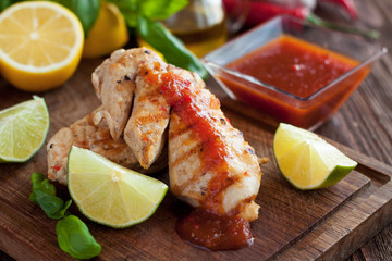 Barbecued chicken fillet with spicy sauce