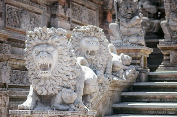 Traditional Balinese stone sculpture art and culture at Bali, Indonesia. Architecture, traveling and religion.