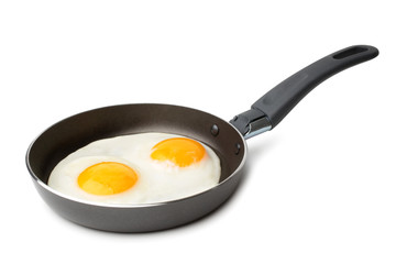 Fried eggs on griddle