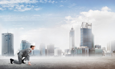 Fototapeta premium King businessman in elegant suit running and business center at background