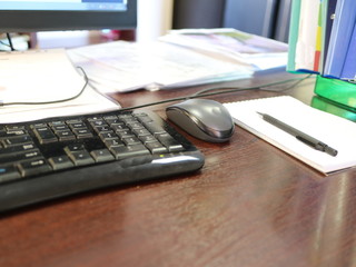 Fototapeta na wymiar Keyboard, mouse, notebook on the table