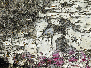 multi-colored paint on uneven surface