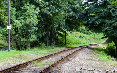 Fototapeta premium Railway Track. A stretch of railway track on the preserved Lakeside and Haverthwaite railway in Cumbria, northern England.