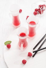 summer drink with rapsberry on white background.