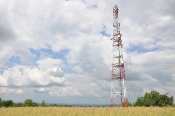 Communication tower on a field