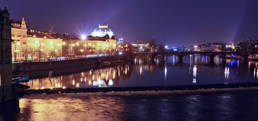 Fototapeta na wymiar Prague city with warm lights glowing on streets