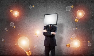 Businessman with TV instead of head.