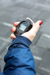 Running stopwatch in the hand