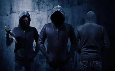 Foto op Aluminium Gang of robbers or burglars dressed in black © chaiyapruek