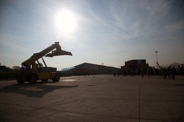 Silhouette of Forklift trucks container handlers, storage facilities to prepare the work.