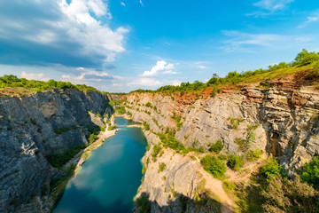 Fototapeta na wymiar Velka America canyon, abandoned limestone quarry, Centran Bohemian Region, Czech republic