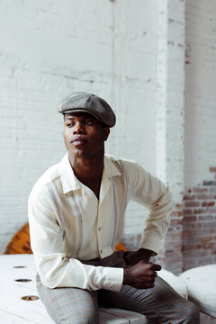 Stylish black man posing at home