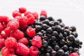 Berries of raspberries and black currants.