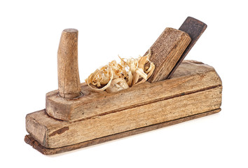 Old wooden jointer and wood shaving on a white background