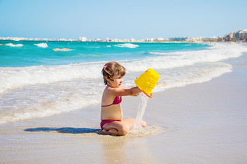 Child girl bathes on the sea and in the pool. Tunisia Mahdia. Selective focus. 