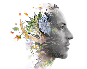 Paintography. Double exposure. Close up of man with strong features and flawless skin dissolving...