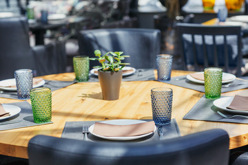 Table arrangement in restaurant. Event design