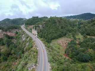 Fototapeta na wymiar Aerial view of highway and natural landscape