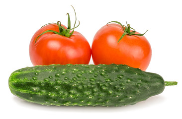 Tomatoes and cucumber isolated on white background