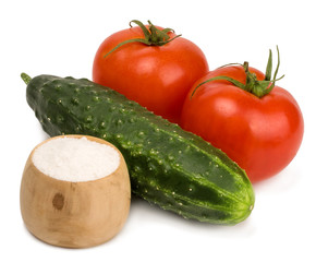 Tomatoes and cucumber isolated on white background